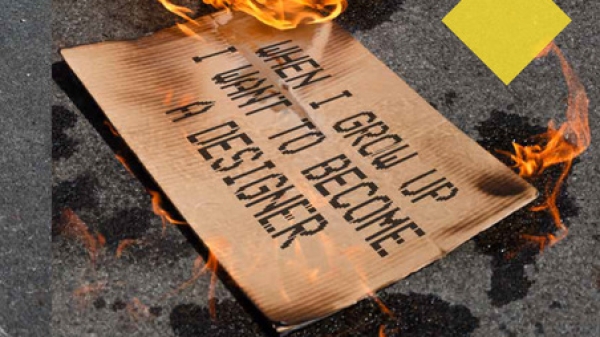 Text: Design Revolution Now! A Designer`s Toolbox for Revolution. A burning piece of paper
                                          lies on the ground, text written on it says: When I grow up I want to become a designer.